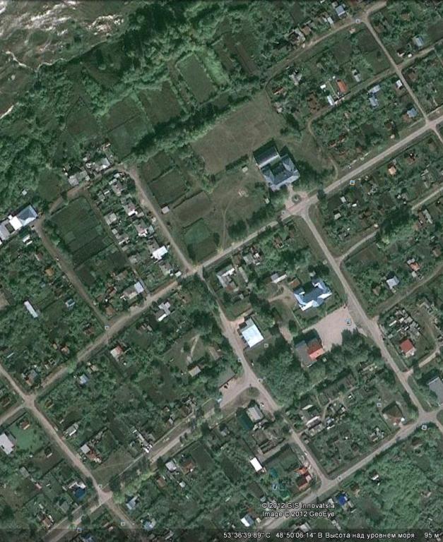Фрагмент снимка села из космоса